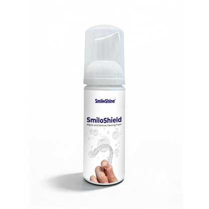 Front view of SmiloShield Aligner and Denture Cleaning Foam bottle highlighting the peppermint flavor and antibacterial formula.