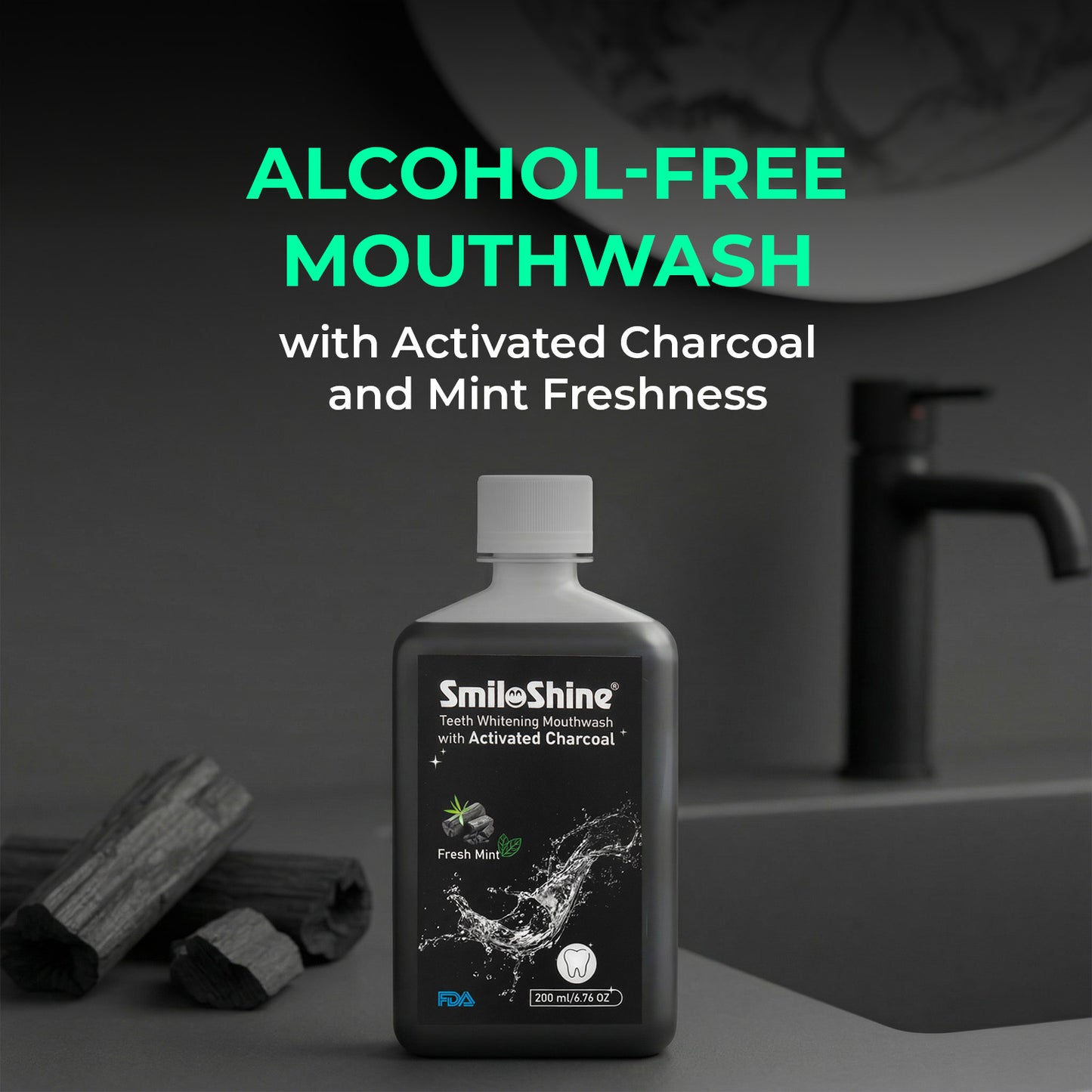 SmiloShine Alcohol-Free Activated Charcoal Mouthwash bottle with mint leaves, ensuring fresh breath without the burn.