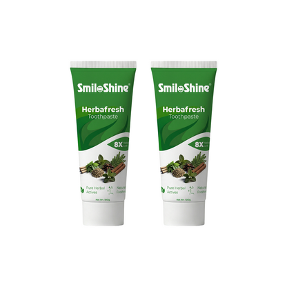 Pack of 2 SmiloShine Herbafresh foaming herbal toothpaste tubes, featuring 8X herbal care for complete oral protection. Made in India.